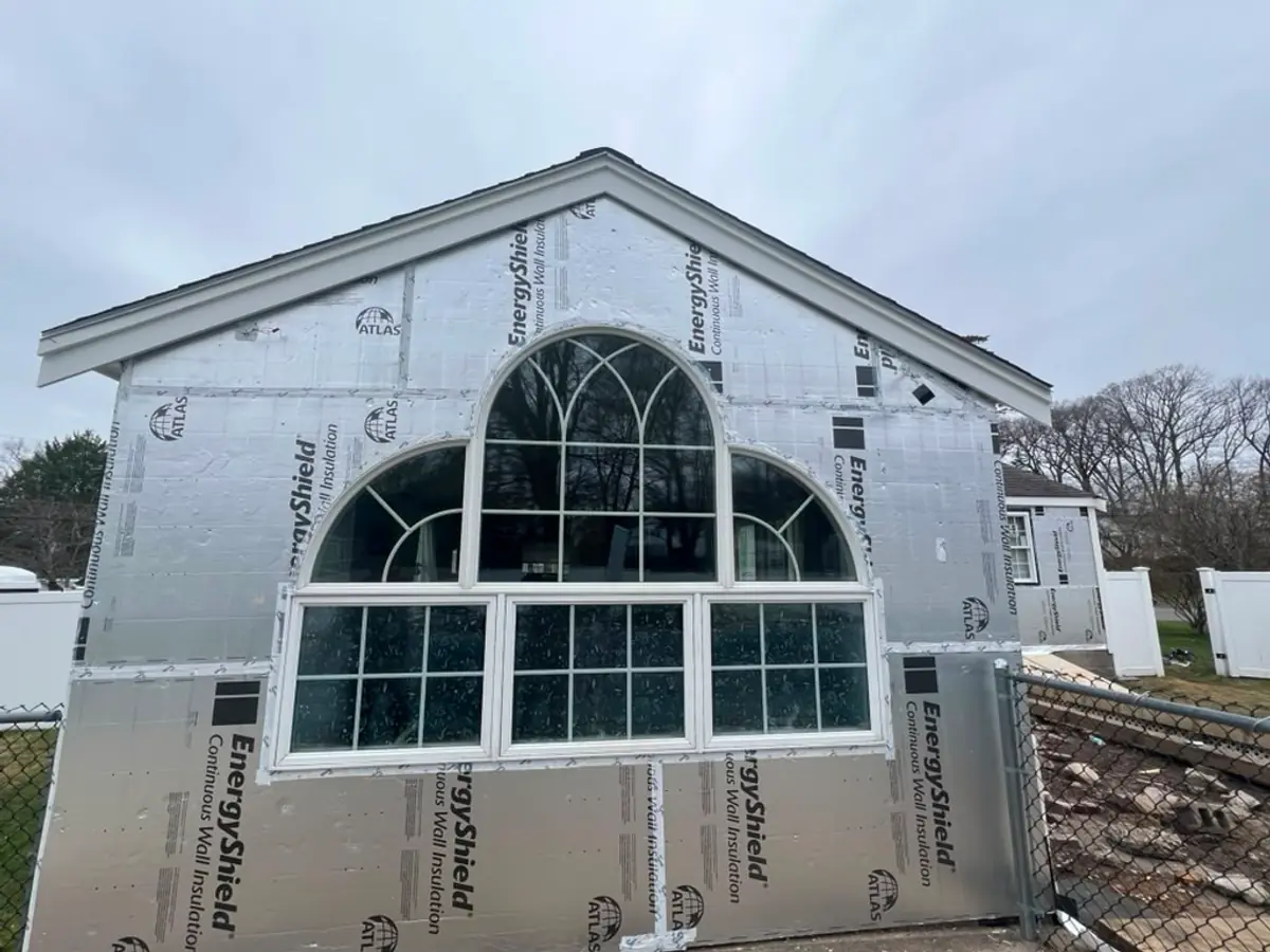 Siding, Windows & Custom PVC Trim in Woburn, MA — mid-job