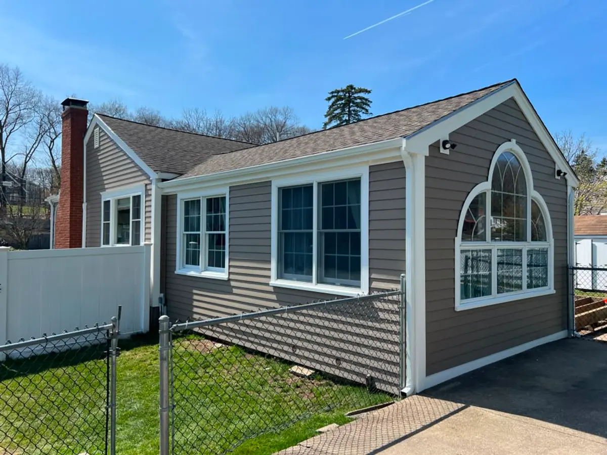 Custom PVC Arch Trim thumbnail - Siding project in Woburn, MA